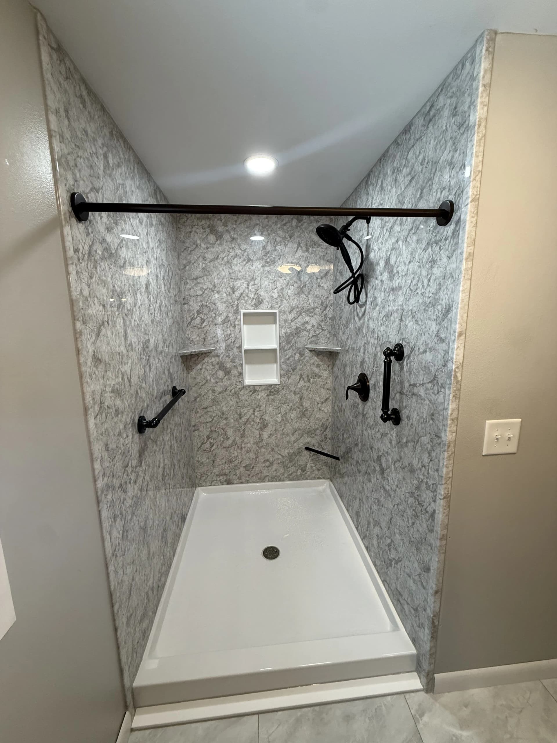 Beautifully remodeled bathroom by Rare Contracting LLC